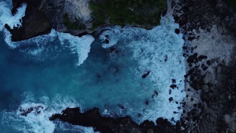 High-angle-static-dramatic-view-of-foam-and-rock-waves