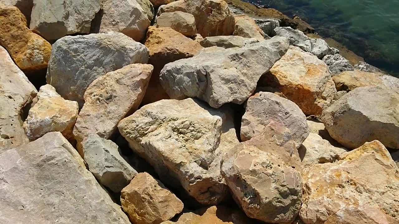 Summer Daytime View At Big Rocks Near Calm Sea