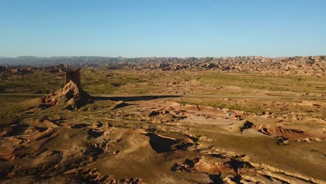 desert cliff dust sand erosion landform in hot climate road concept of transportation car driving vehicle summer season scenic landscape of panoramic natural attraction middle east qatar saudi culture