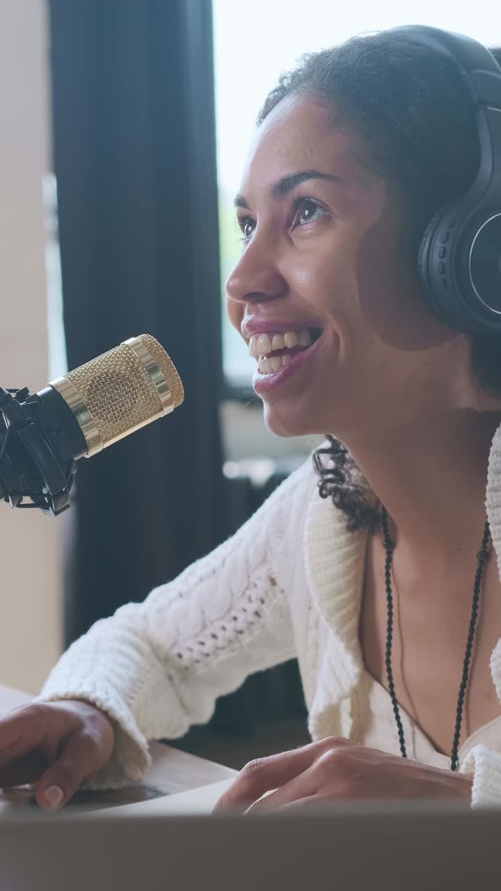 Young smiling pretty african american woman journalist reads out good news