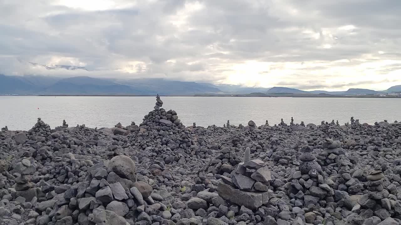 mini stone monoliths in Reykjav&iacute;k harbor