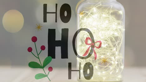 animación del texto ho ho ho sobre las luces de navidad