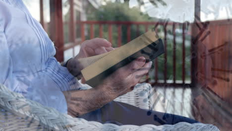 covid-19 cells moving against woman reading bible