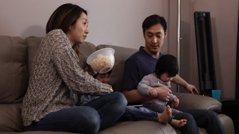 family enjoying time relaxing together at home