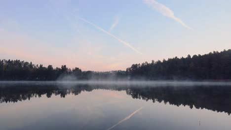 fogg moving slow at the sunrise lake