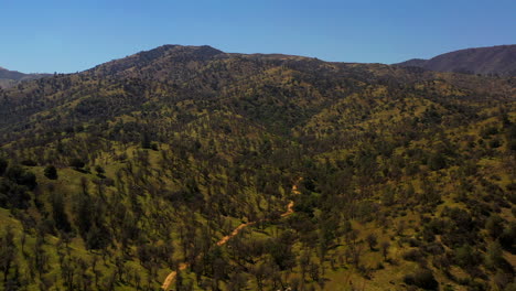 an off-road trail winds its way up a canyon in the tehachapi mountains in southern california - aerial view