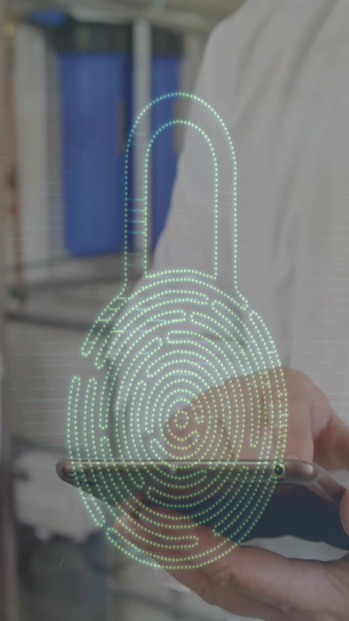 Animation of dna strand spinning and data processing over businessman using tablet