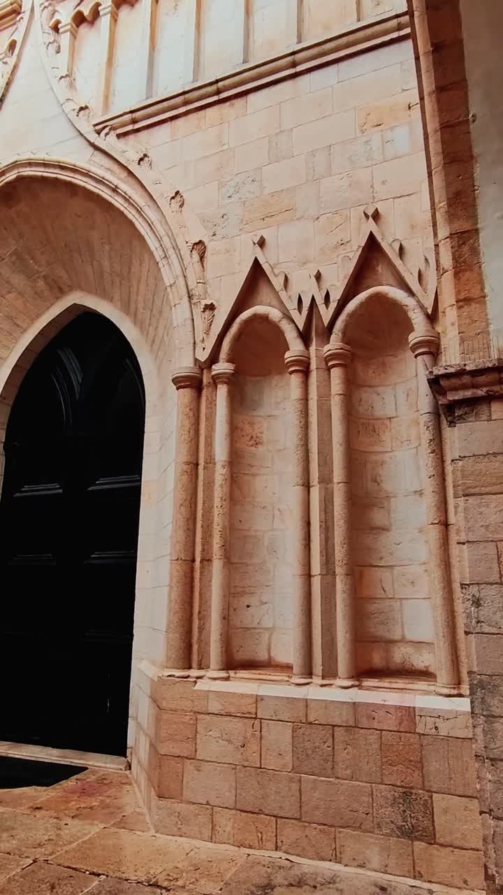 Vatican Flag on the Wall of a Historic Church in Jerusalem