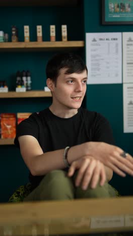 young man in a vape shop