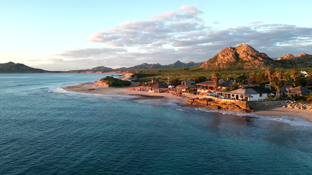 Ocean Lapping on Small Beach Town Shore