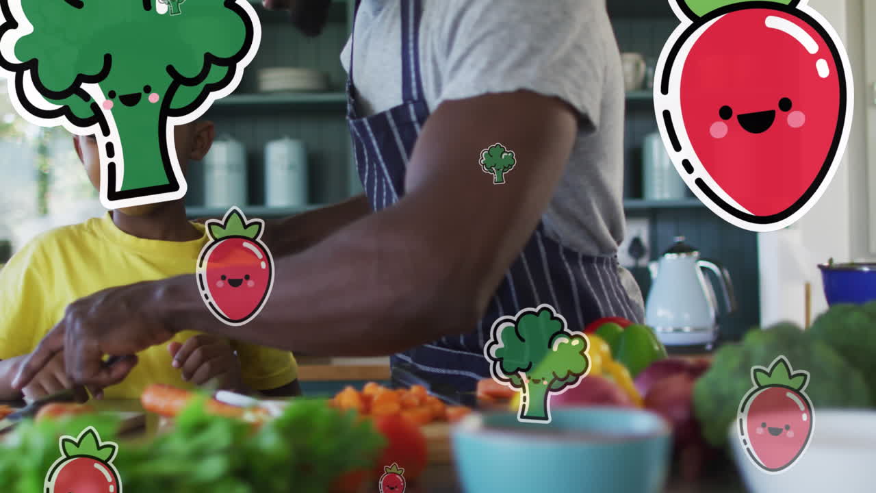 Animation de légumes flottant au-dessus d'un père et de son fils afro-américains heureux préparant un repas