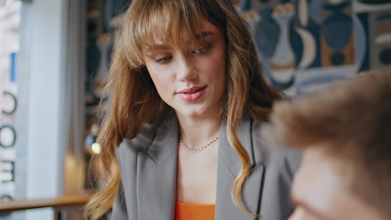 Inspired woman mentor consulting colleagues workplace closeup. Thoughtful lady