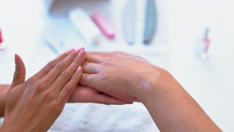 hands on woman at salon, massage