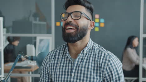 happy businessman in modern office