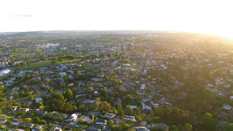 aerial view of a suburban neighborhood at sunset