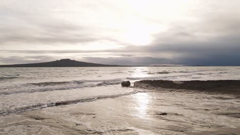 Forward-dolly-shot-from-the-sandy-beach-of