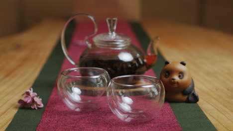 elegant tea setting with panda figurine