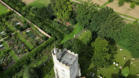 a fast drone flyover of holy cross church in goodnestone