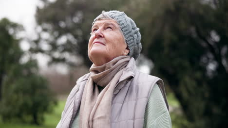 Old-woman,-meditation-and-calm-in-the-park