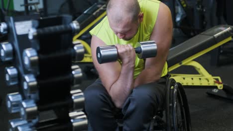 man with disabilities training in the gym of rehabilitation center