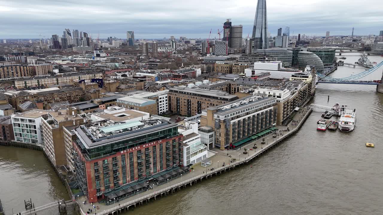 Butler's Wharf building Shad Thames London drone,aerial pull back drone aerial reverse turning reveal
