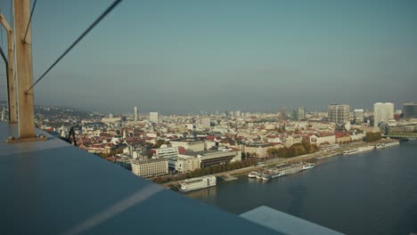 bratislava cityscape with danube river, modern skyline, and bridge structure in view