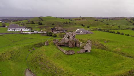 Clonmacnoise-castle-on-overcast-day.-Aerial-establishing-shot