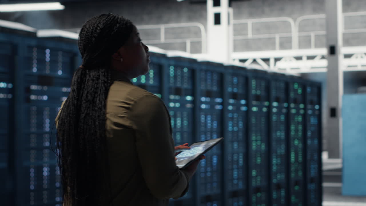 Developer doing data center automation using AI neural networks on tablet