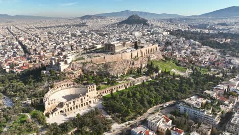drone footage around the acropolis of athens in greece on a sunny day