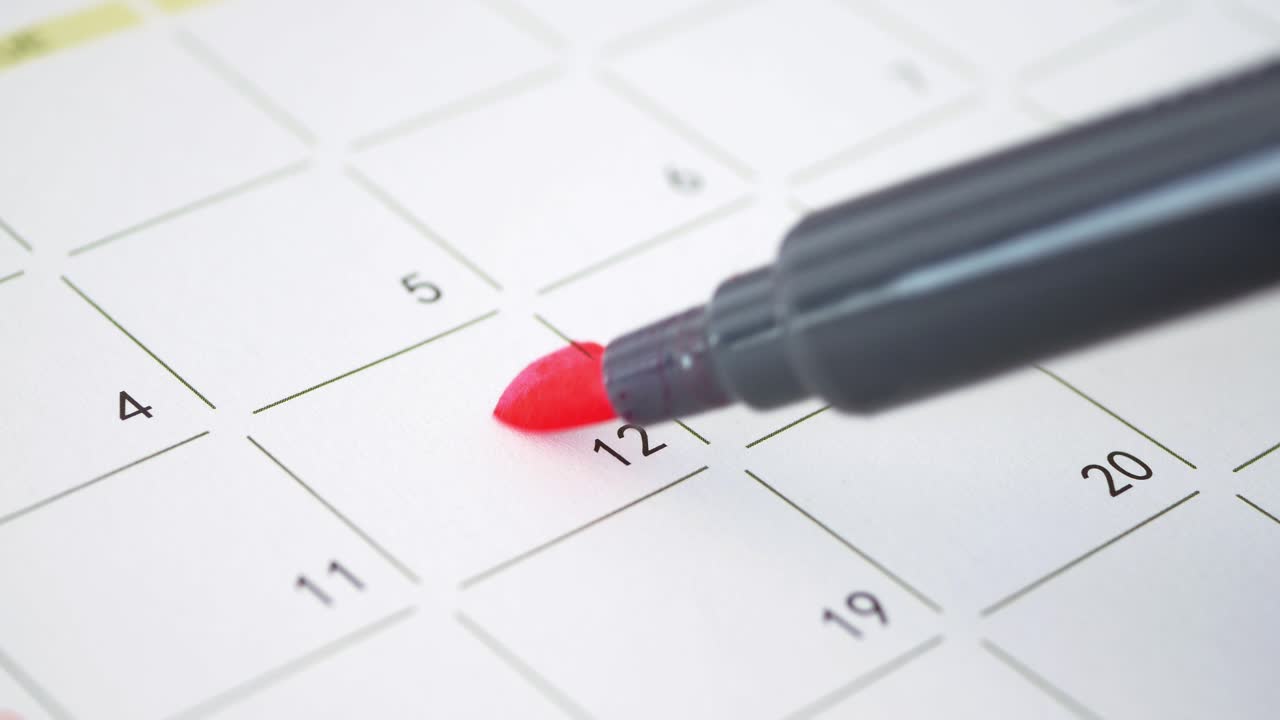 Red circle on a calendar marking the 12th day of the month
