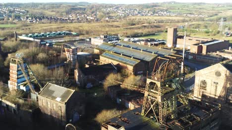 abandoned run down staffordshire historical industrial coal mine buildings aerial view