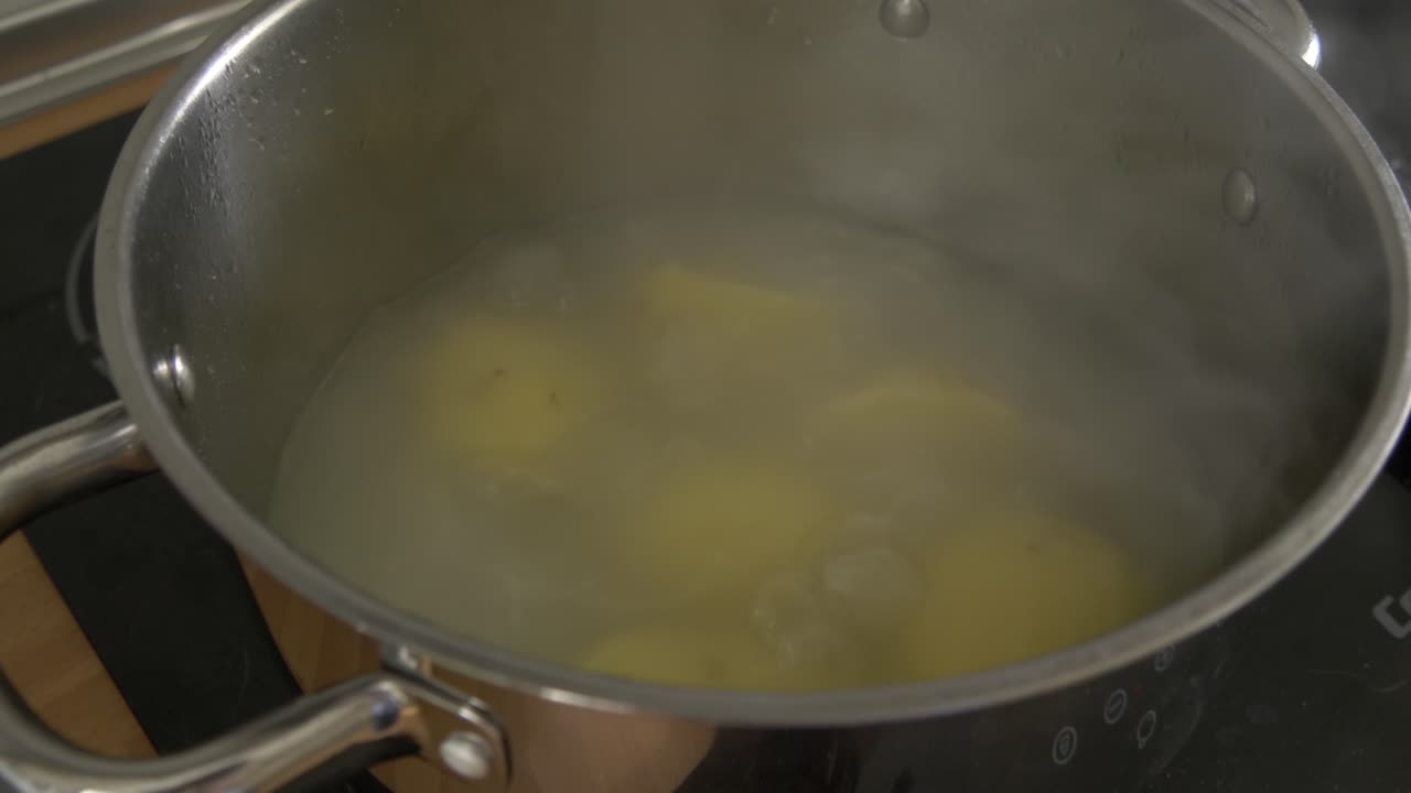 boiling potatoes in a pot