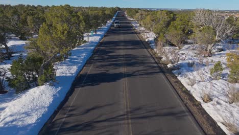 Aerial-Fly-Over-Paved-Road-At-Desert-View-Drive---Grand-Canyon-National-Park-In-Arizona,-USA