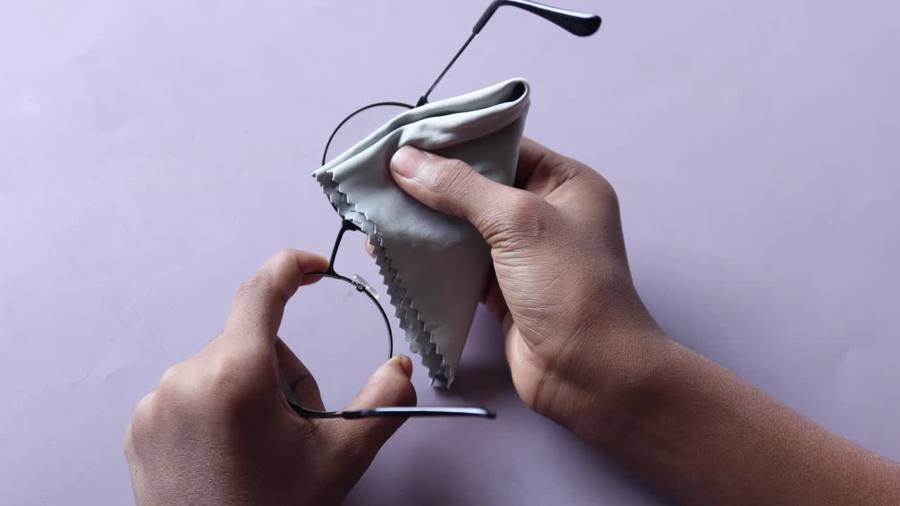 Cleaning Eyeglasses with a Cloth