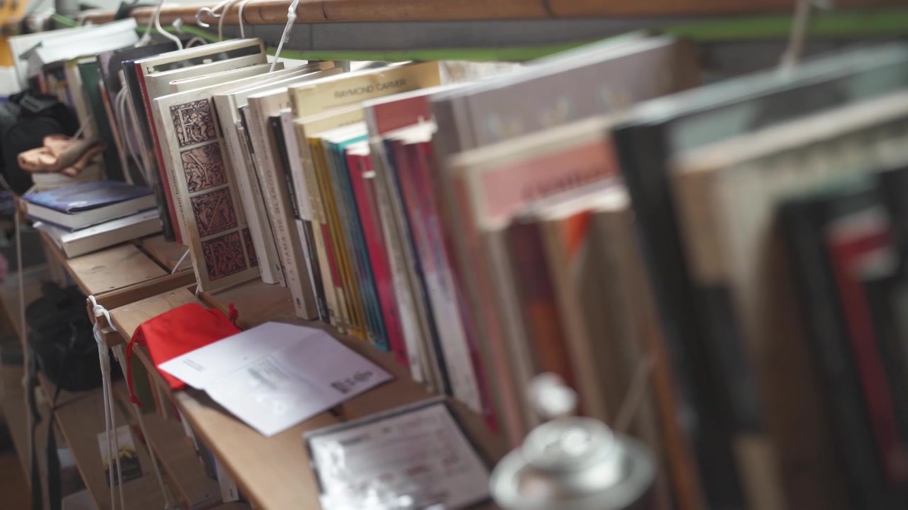 Close up shot of messy row of books
