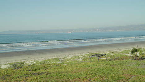 beautiful sunny day with calm waves at the beach in baja california