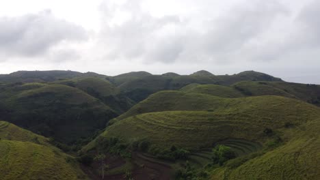 aerial,-verdant-Teletubbies-Hills-in-Nusa-Penida-Tropical-Island,-Bali-indonesia