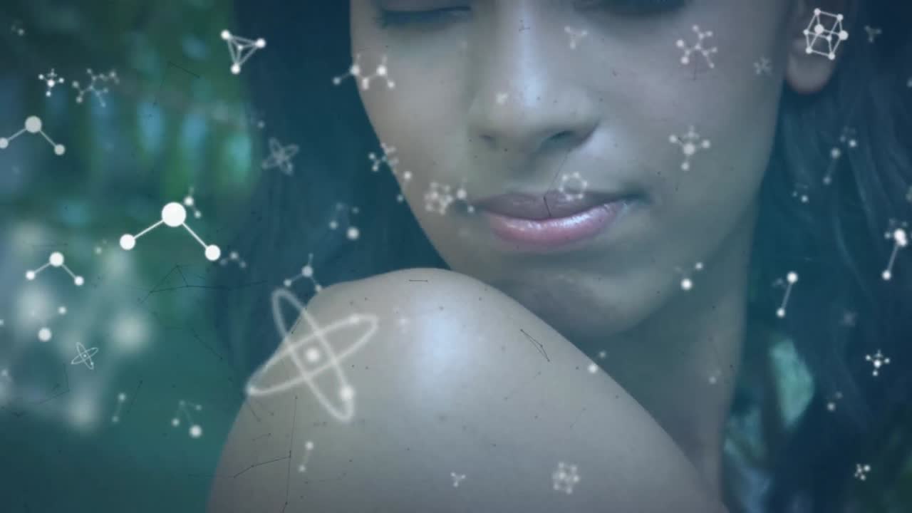 두 인종의 여성 위에 떨어지는 분자의 애니메이션