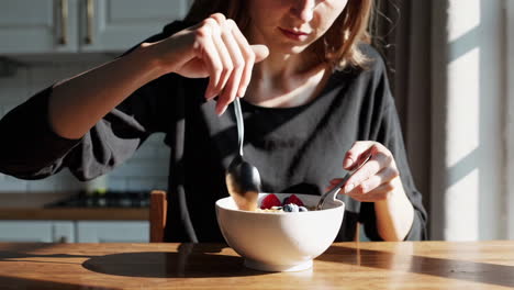 woman eating healthy breakfast