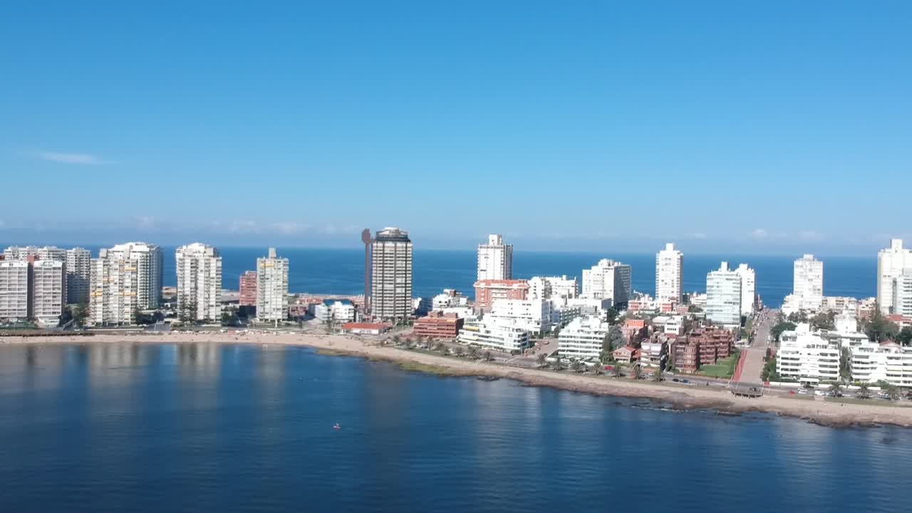 Aerial View of Coastal City with Beach and Ocean