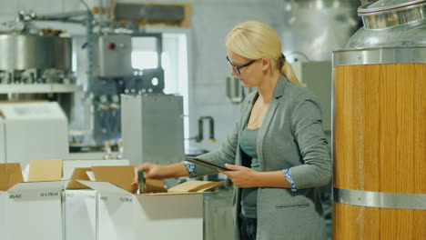 winery quality inspector with tablet