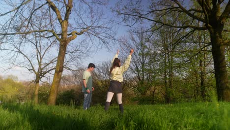 young adults playing in a park