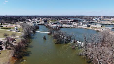 aerial view over fox river and kaukauna, small town in wisconsin during early spring