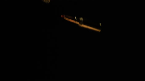 slow motion of 300 aac blackout bullets against black backdrop