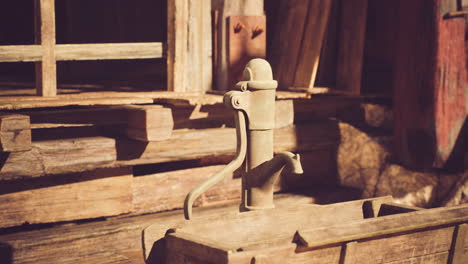 vintage water pump in rustic setting