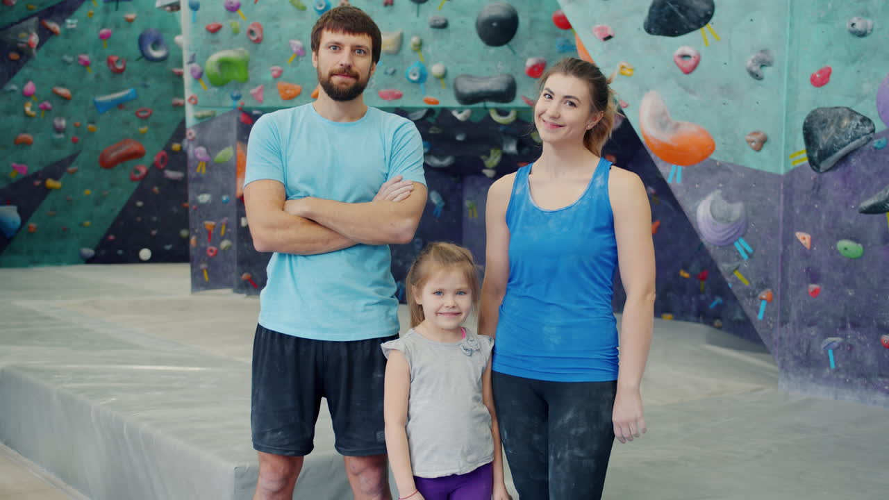 Happy Family at the Rock Climbing Gym