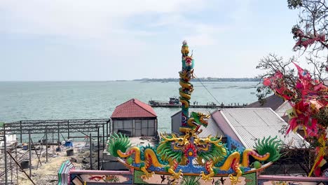 colorful temple overlooking the sea in chonburi