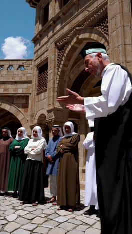 religious gathering in a historical courtyard