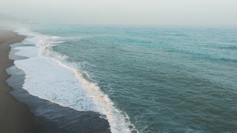 ocean stormy waves crashing during nearby hurricane aerial