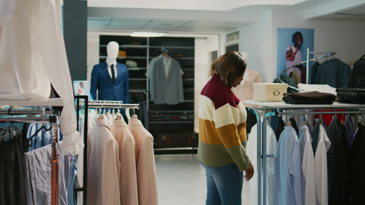 People shopping for clothes in a clothing store